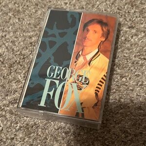 George Cassette Tape - Black and Orange